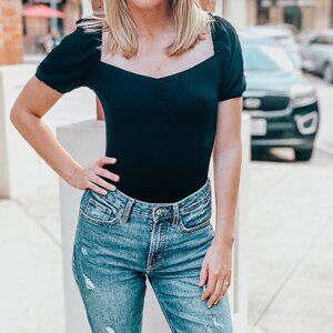 Black ribbed body suit